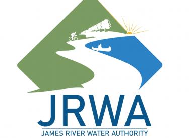 JRWA Logo depicting a diamond shaped background with a river flowing vertically through the diamond shaped background. 